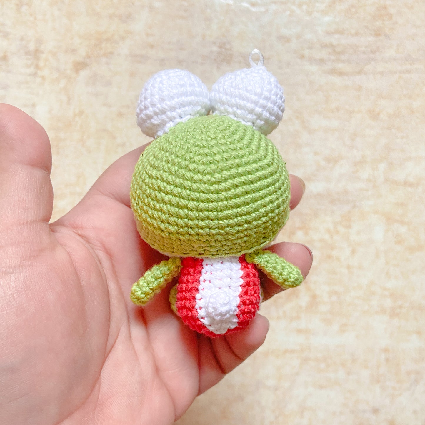Hello Kitty in Keroppi Suit